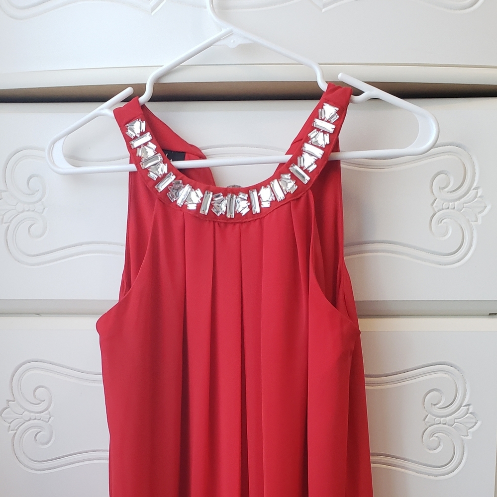 Red, jewel neckline flowing dress